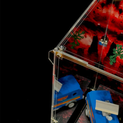 Close-up of the acrylic display case corner showing transparent panels and connecting hardware