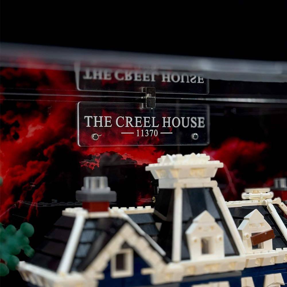 Close-up of the display case nameplate reading The Creel House 11370
