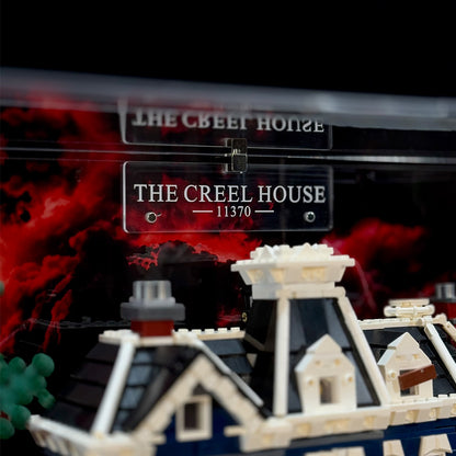 Close-up of the display case nameplate reading The Creel House 11370