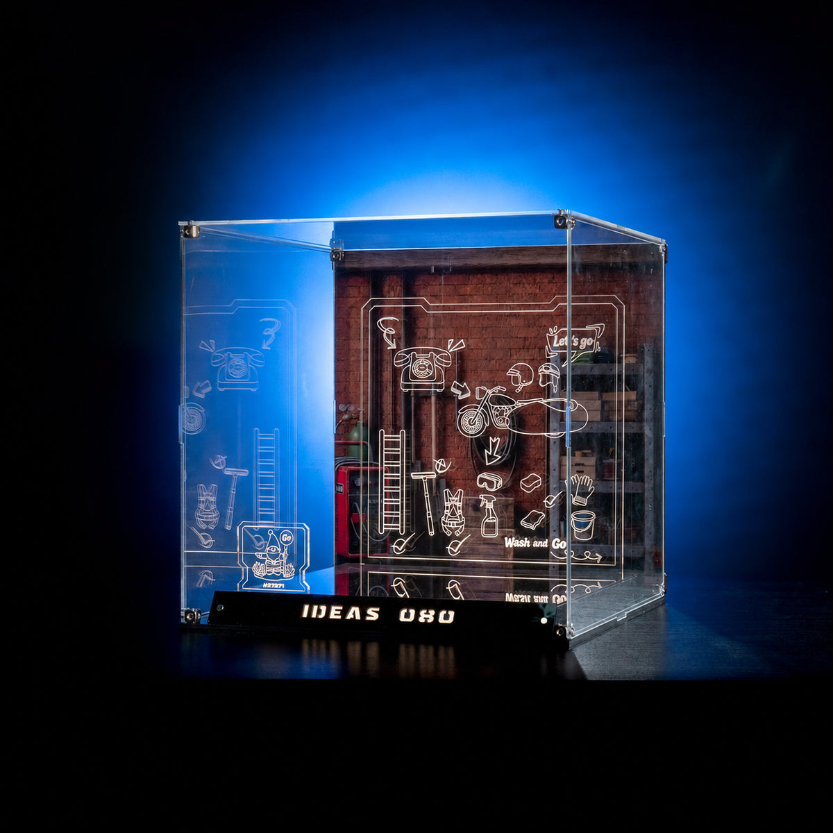 KGBOX collector LED display case side view for LEGO 21371 Wallace and Gromit, showing engraved line-art panel