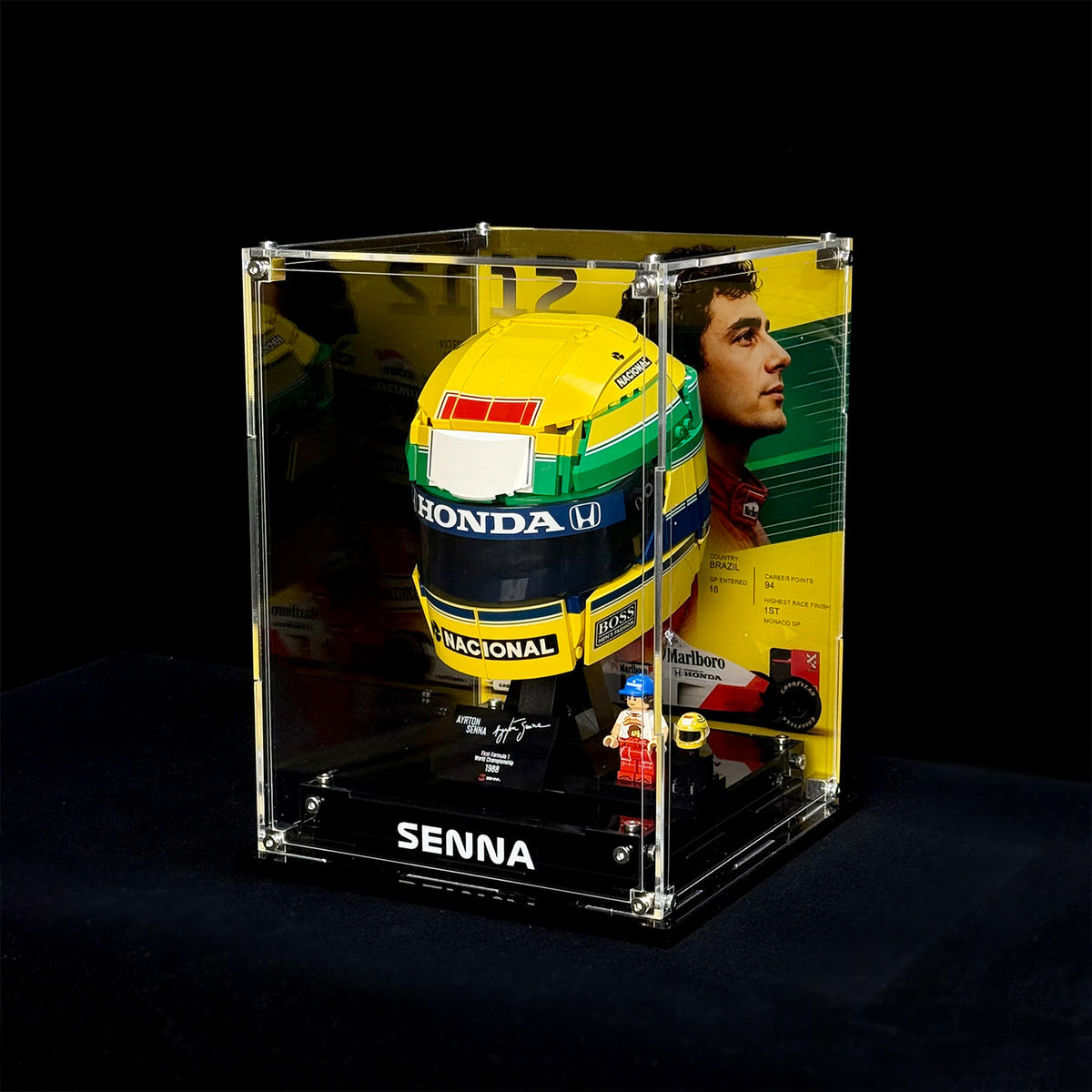Front angled view of the display case for LEGO 43024 Ayrton Senna's Helmet; model shown for illustration